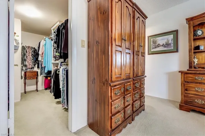 Master Walk in Closet with custom shelving