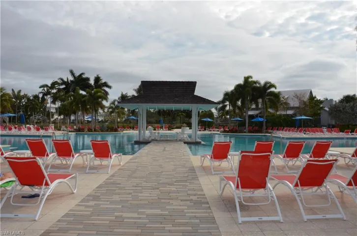 View of pool featuring a gazebo and a patio