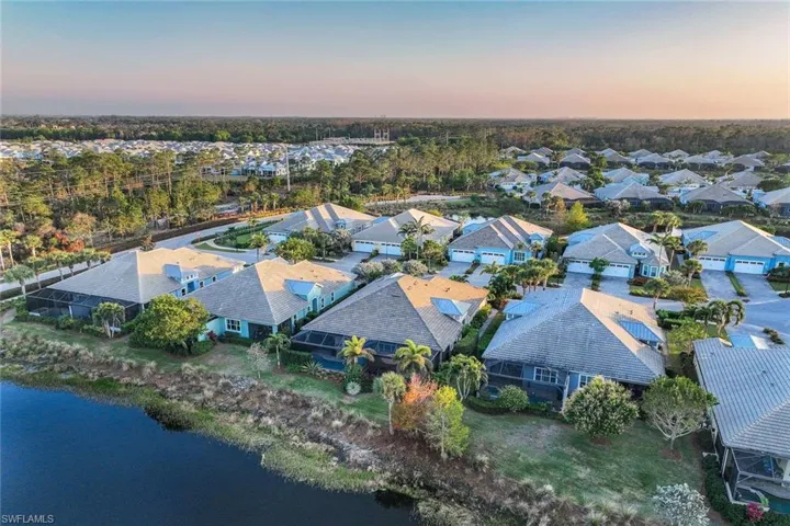 Aerial view at dusk with a water view