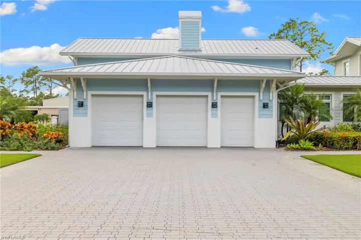 Garage featuring driveway