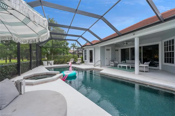 Swimming Pool/Spa Featuring an Outdoor Living Space, a Covered Lanai, Ceiling Fan