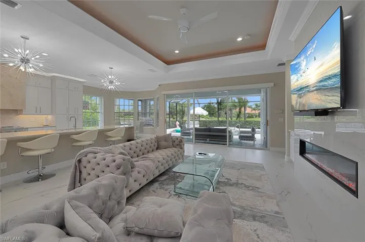 Living Area Featuring Chandeliers, Plenty of Natural Light