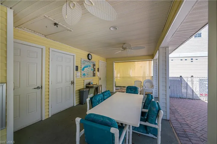 View of patio / terrace with outdoor dining space and a ceiling fan