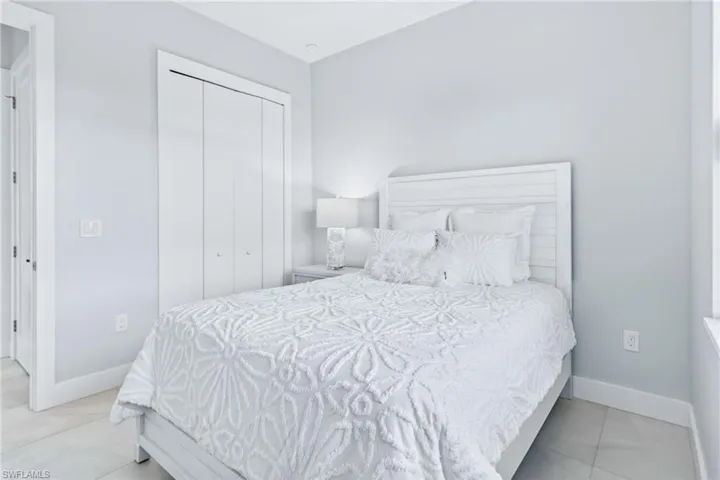 Interior room featuring light-toned wall paint and matching trim
