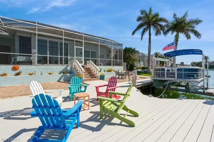 View of dock featuring a lanai