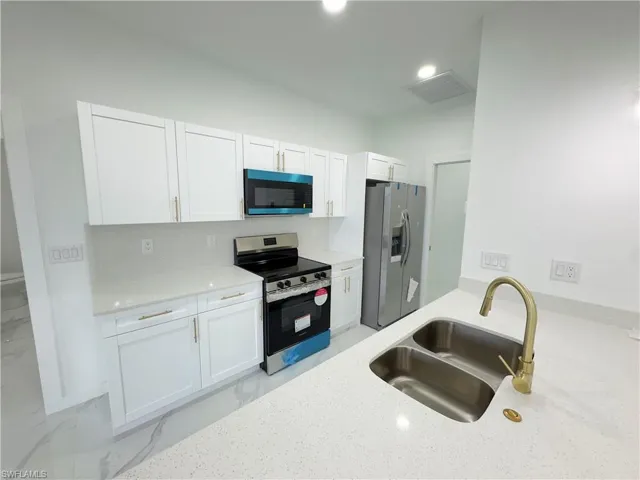 1119 NW 22nd  ST, Cape Coral, FL 33993