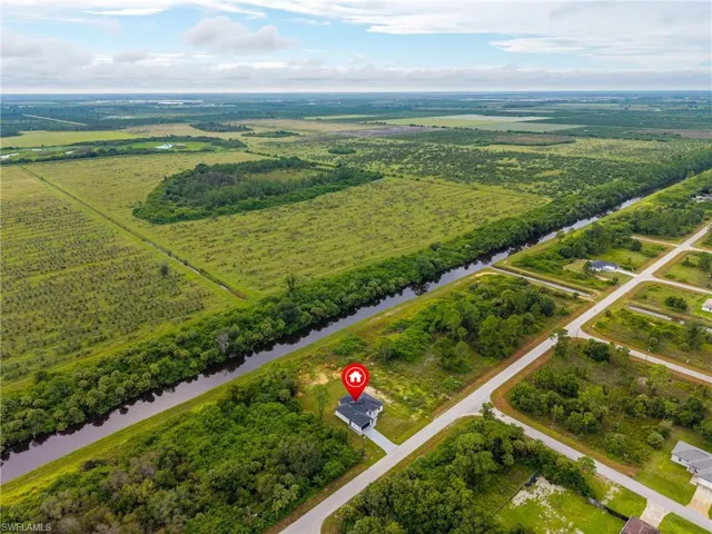 Overview of rural landscape with a nearby body of water