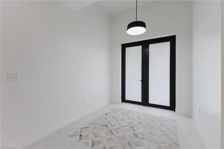 Foyer featuring baseboards