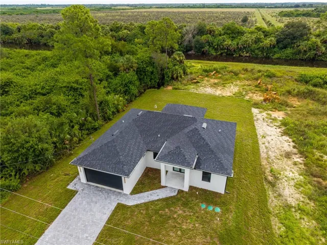 Aerial view of property and surrounding area