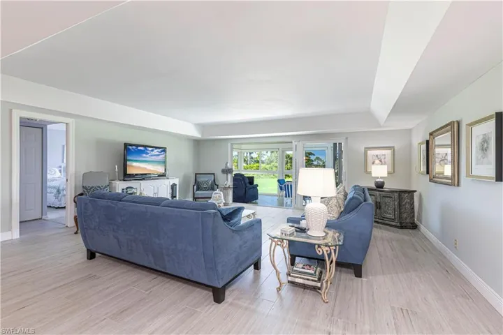 Living area with wood tiled floors
