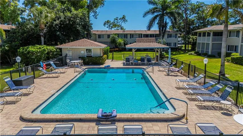 Community pool featuring a gazebo and a patio area