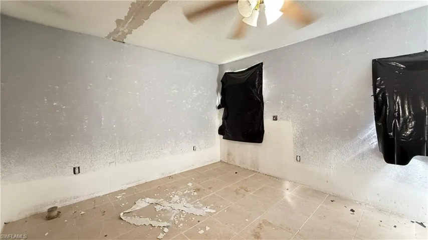 Spare room featuring ceiling fan