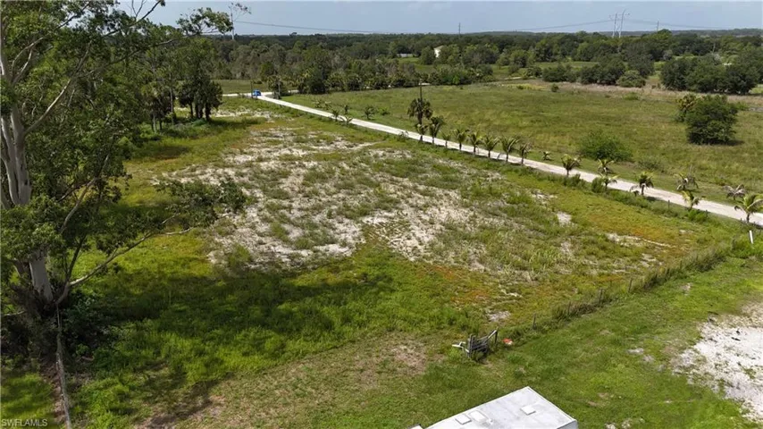 Aerial view of property and surrounding area with rural landscape