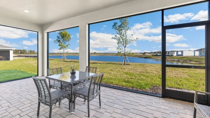 Screened patio featuring paver flooring
