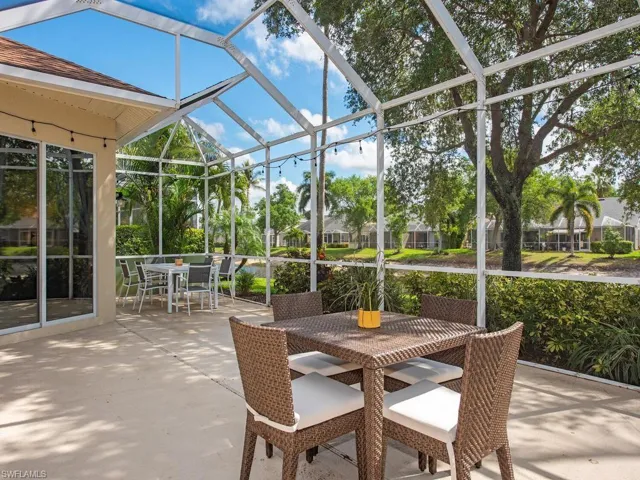 Screened-in patio with concrete flooring