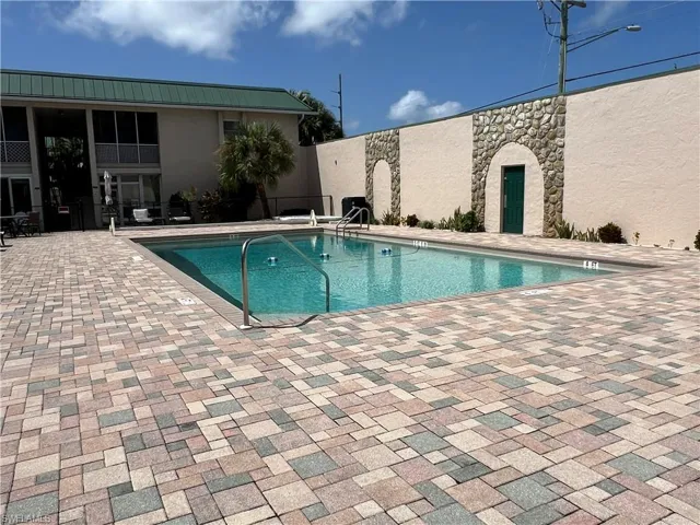 View of swimming pool with a patio area