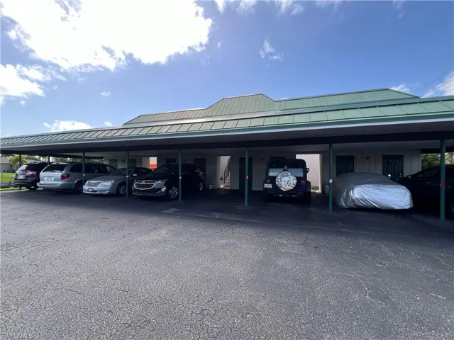 View of car parking with a carport
