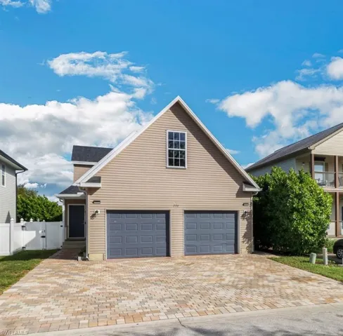 Front of property with a garage