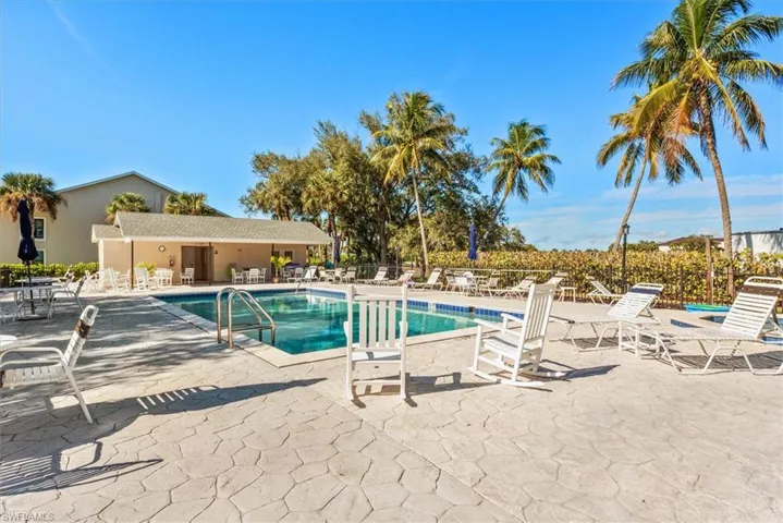Community pool featuring a patio area