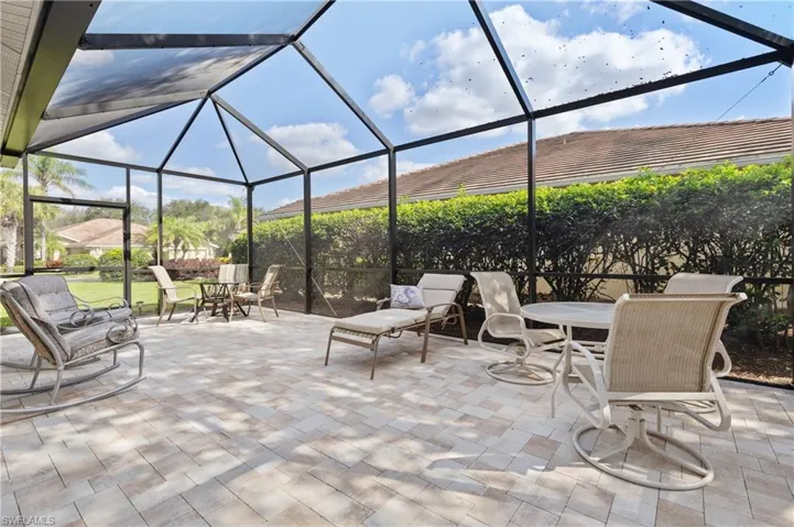 View of patio / terrace featuring glass enclosure