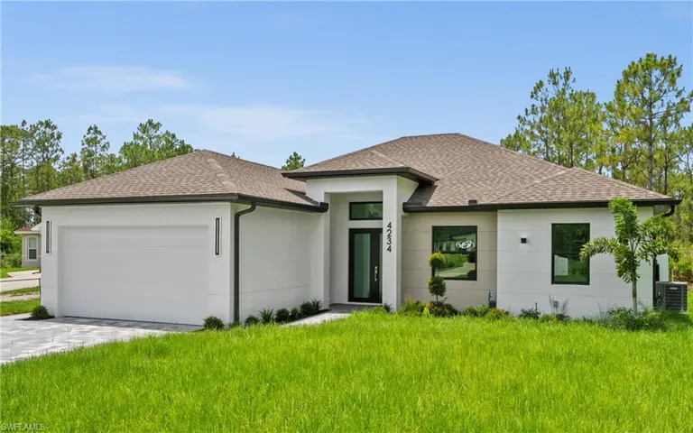 Prairie-style home with an attached garage, decorative driveway, roof with shingles, and stucco siding