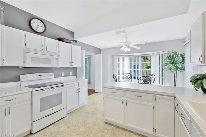 Kitchen is open to living and dining areas