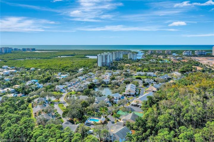 Coastal gem located in area of Million Dollar homes, Powder Sand Beaches, Mercato, plenty of Shopping & Dining Options!