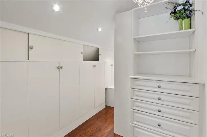 Storage, closet space, dressing room off primary bedroom in loft