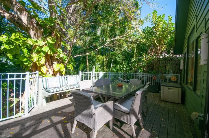 Wooden deck with outdoor dining area