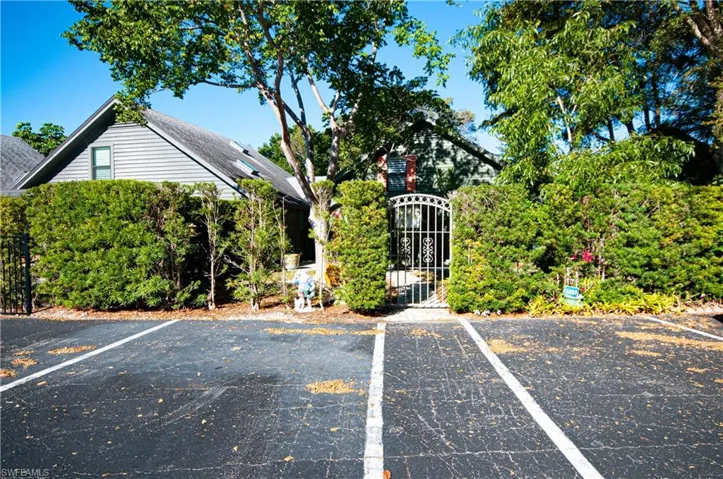 GATE TO COURTYARD, PARKING IN FRONT