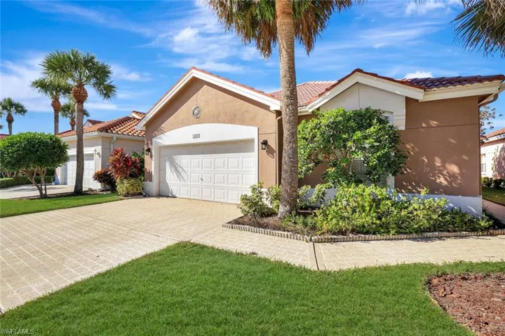 Beautifully landscaped front entry.