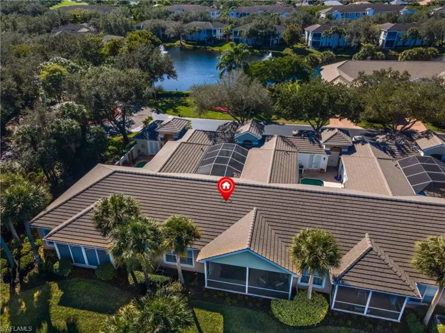 Aerial view of residential area with ponds on both sides