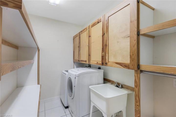 Laundry w/ Custom Cabinetry