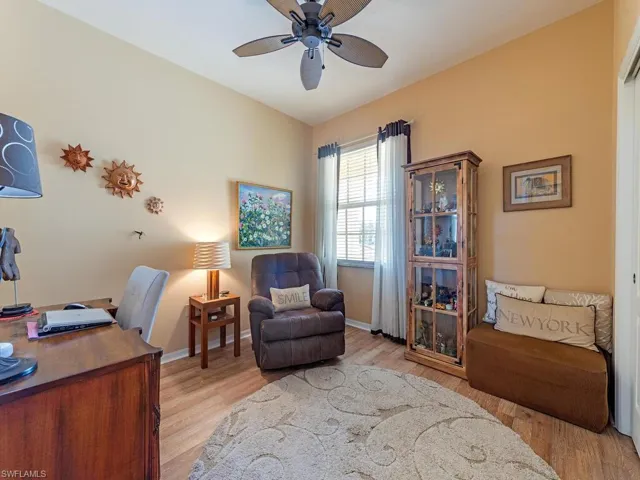 Guest bedroom with high ceilings and lots of natural light. The pocket door located at the entrance hallway to this area creates a second private bedroom suite for guests.