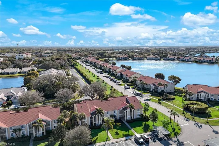 Aerial view of residential area with a nearby body of water