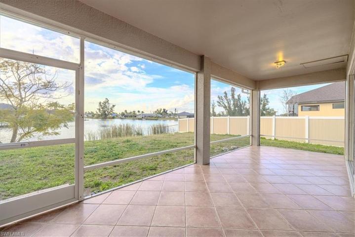 This substantial screened lanai can become your own tropical retreat