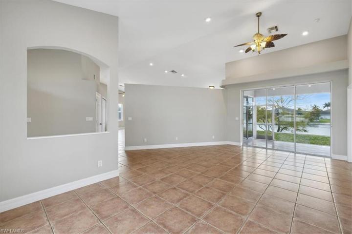 A big open family room & waterfront views greet you