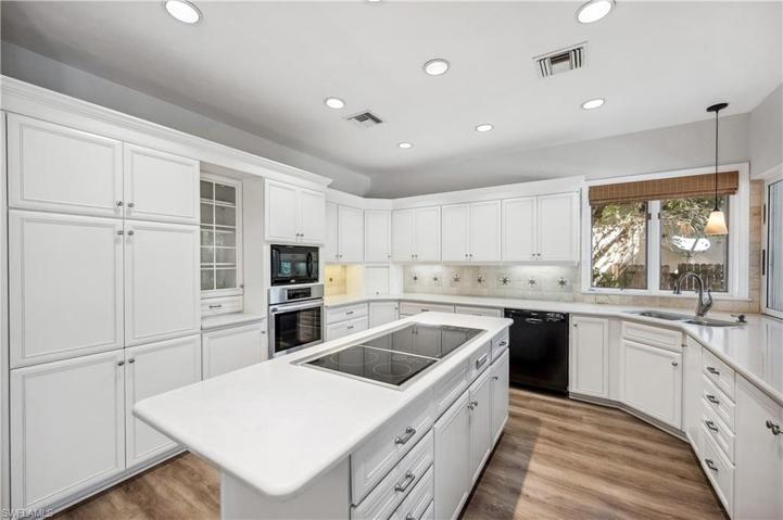 Updated kitchen with Quartz countertops, Wolf induction range & Bosch wall oven.
