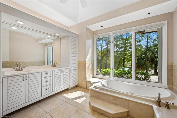 Dual vanity, plenty of storage, dual head shower, stand-alone tub.