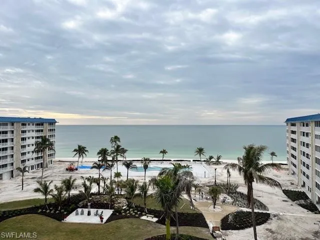 View of water feature featuring a beach view