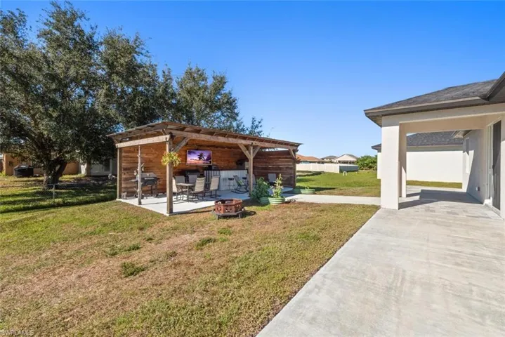 View of yard with a patio area