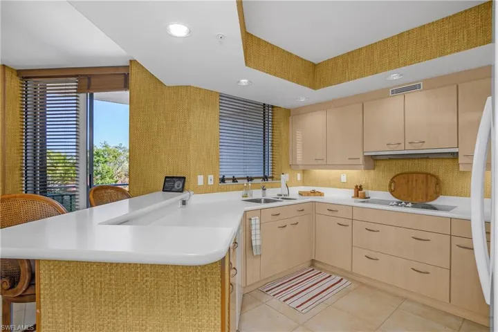 Kitchen adjacent to the den.