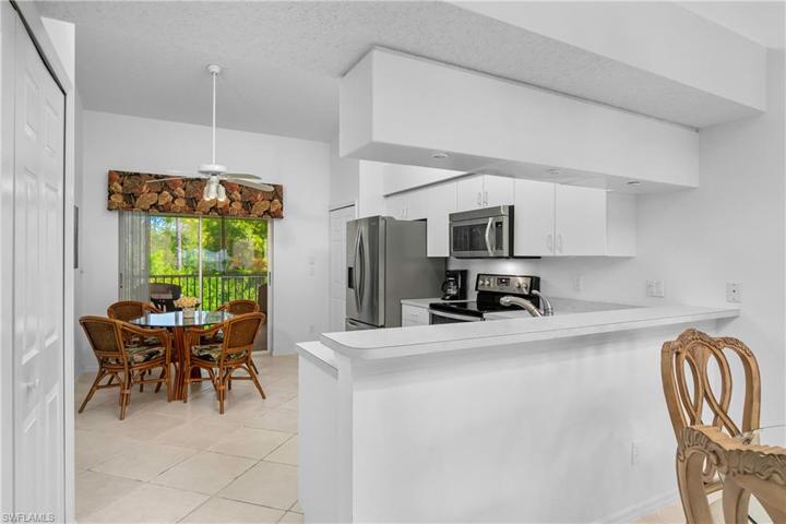 Open kitchen/dining has plenty of room for entertaining guests.