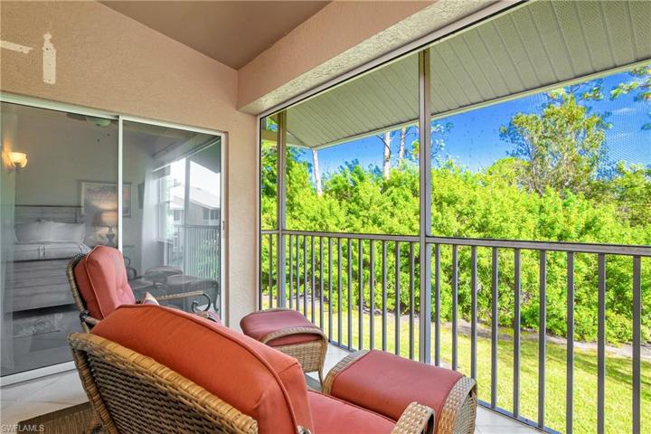 Private tropical views abound at 920 Leeward Passage Ct., located in the desirable community of Vanderbilt Lakes.