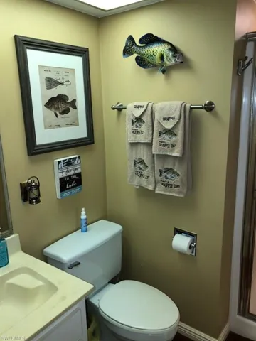 Bathroom featuring toilet and vanity
