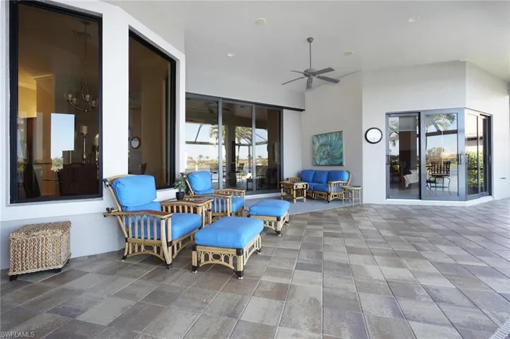 View of patio / terrace with ceiling fan and an outdoor living space