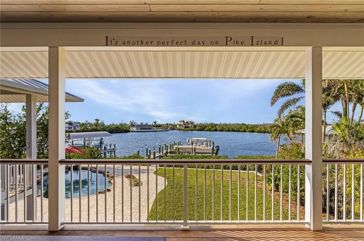 Water view with a dock
