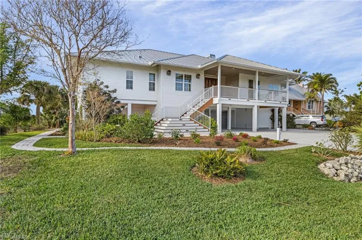 View of front of house with covered porch