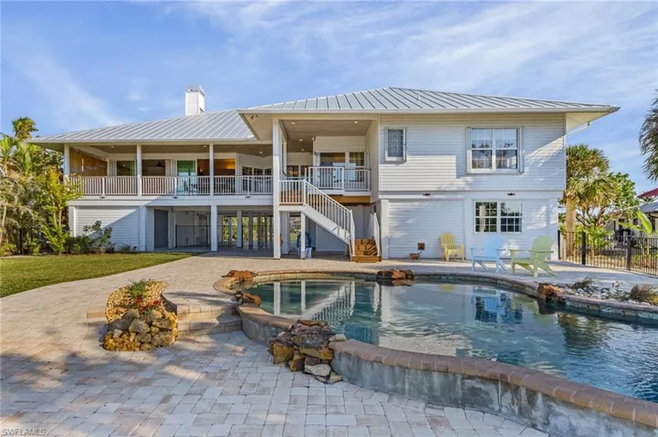 Rear view of house with a patio
