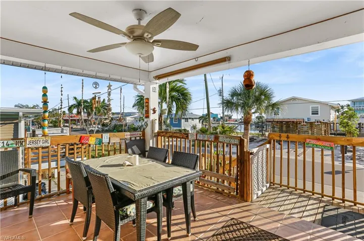 Wooden terrace with ceiling fan